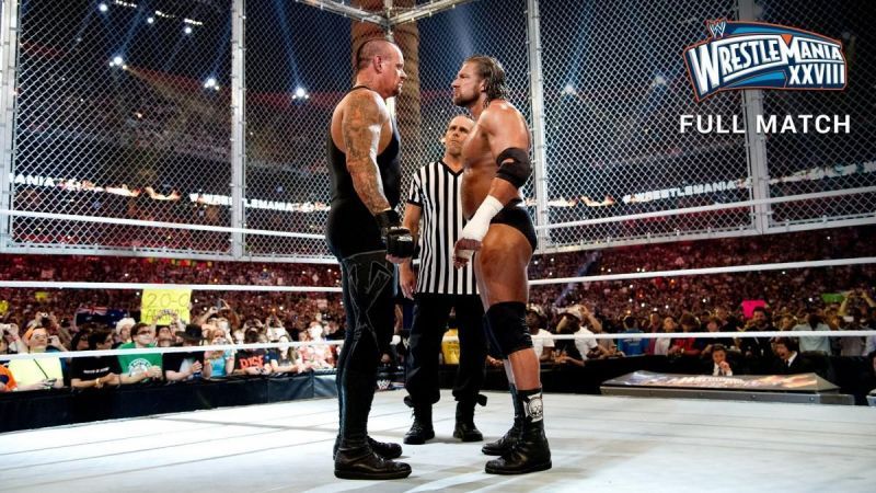 The Undertaker and Triple H collide inside Hell In A Cell