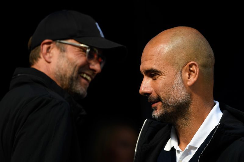 Manchester City boss Pep Guardiola (R) and Liverpool&#039;s Jurgen Klopp (L)