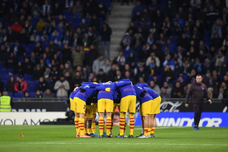 Barcelona players in a huddle