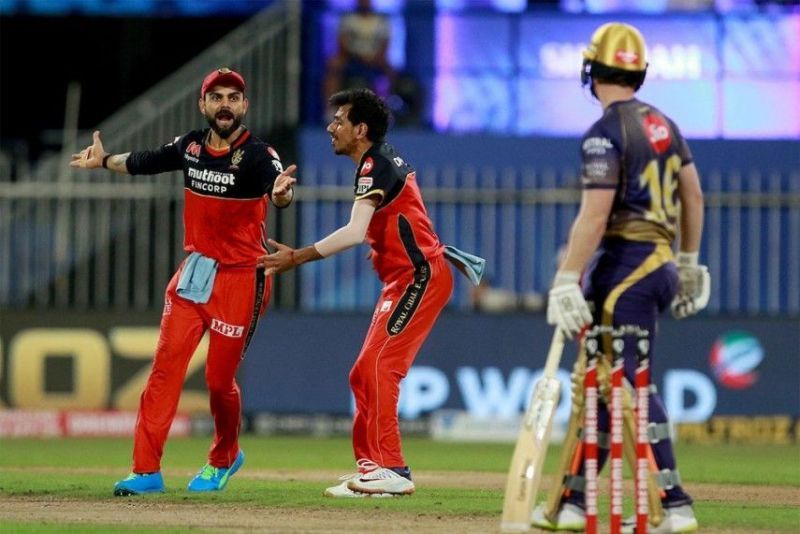 Kohli and Chahal appeal as Morgan watches on.