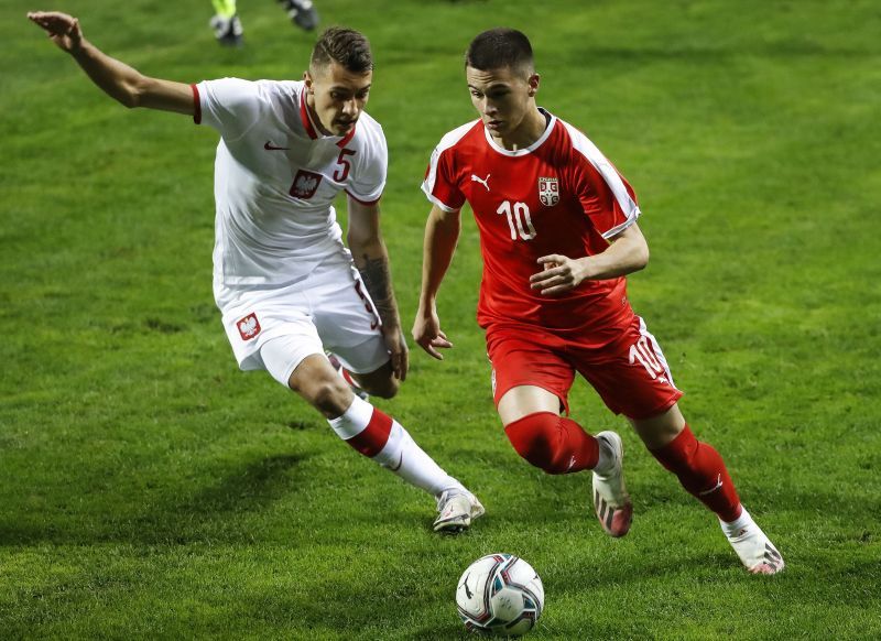 Filip Stevanovic (R) of Serbia in action