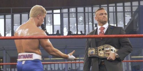 Cody offering a handshake to Nick Aldis