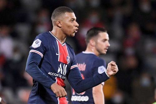 Kylian Mbappe celebrates after scoring a goal for PSG 