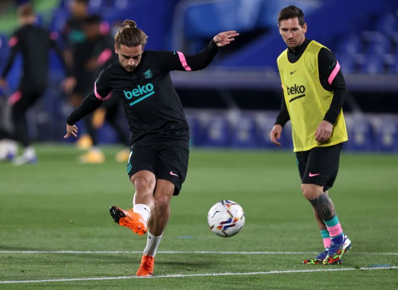 Antoine Griezmann (R) and Lionel Messi of FC Barcelona 