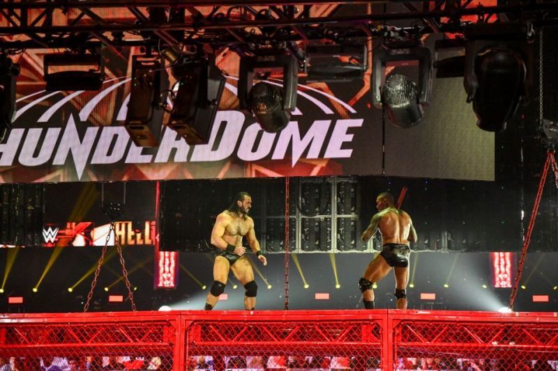 Drew McIntyre on top of the cell.