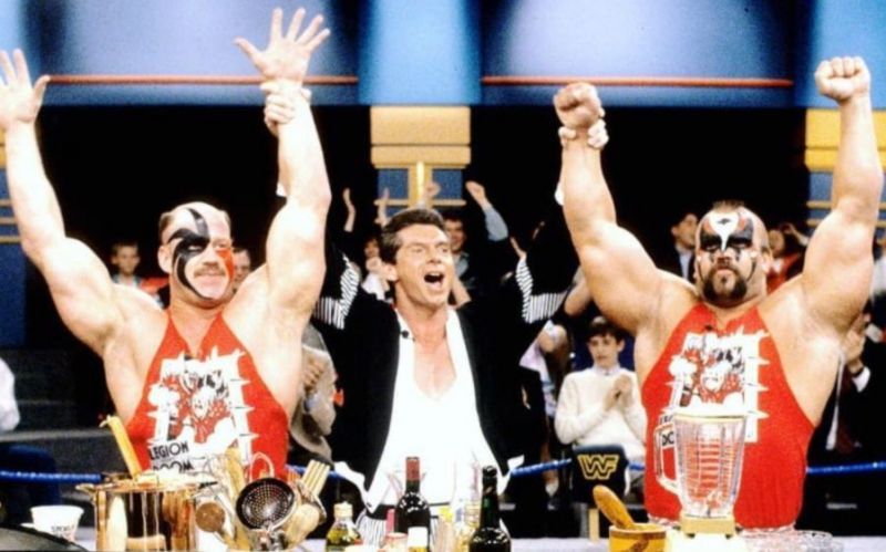 Vince McMahon with The Road Warriors