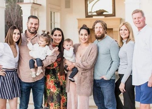 John Laurinaitis, the brother of Road Warrior Animal, with their family