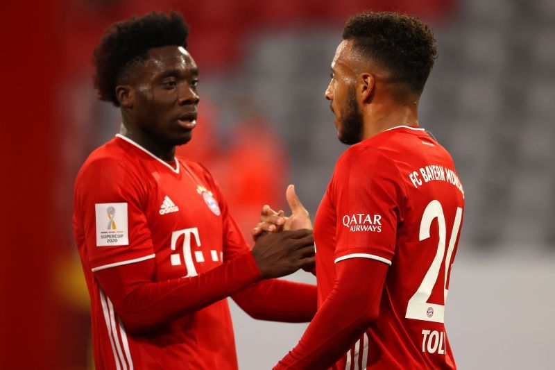 Bayern Munich's Davies and Tolisso celebrate after a lightning counter-attack was finished in the first half