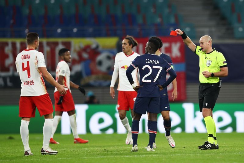 Gueye can't believe his luck as ref Szymon Marciniak shows him red at a crucial moment in the second half