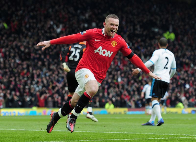 Wayne Rooney celebrates scoring a goal against Liverpool