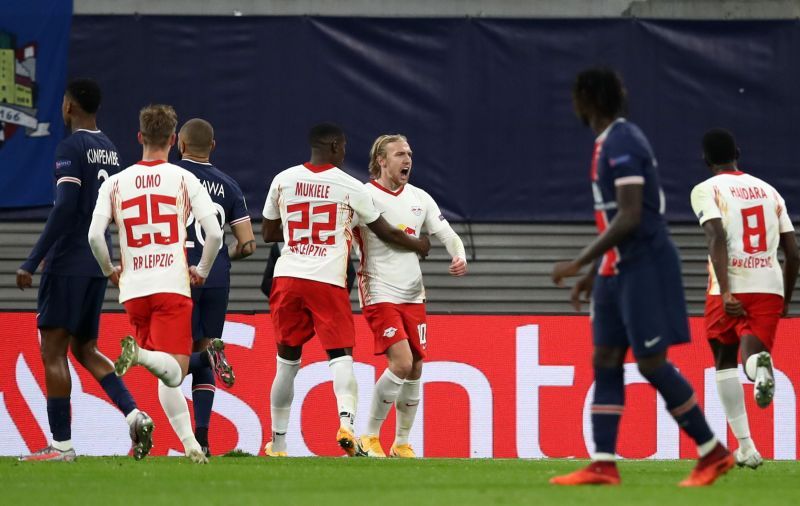 RB Leipzig players celebrate after Emil Forsberg&#039;s second-half penalty against PSG