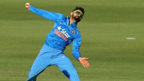 Virat Kohli with his trademark action