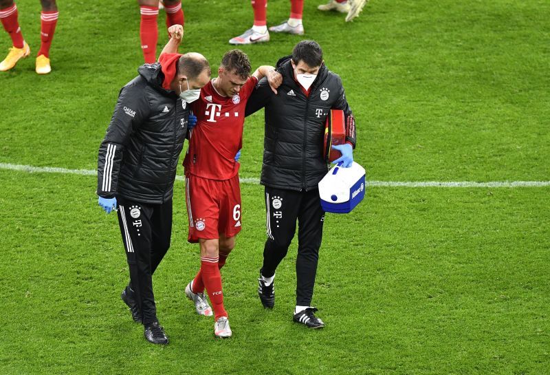 Joshua Kimmich had to be taken off after he injured himself while challenging Erling Haaland