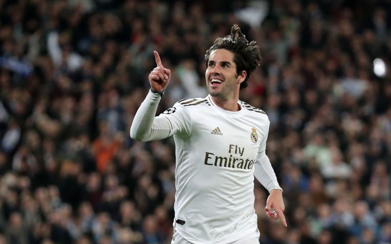 Isco celebrates after scoring against Manchester City
