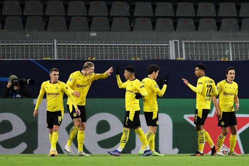 Borussia Dortmund face off against FC Koln in the Bundesliga