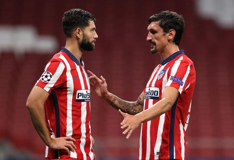 Felipe and Stefan Savic of Atletico de Madrid