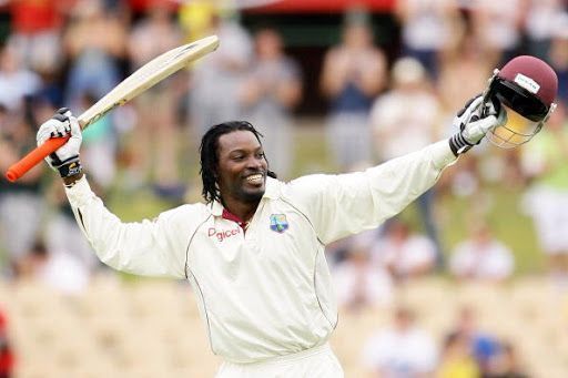 Chris Gayle is seen celebrating a milestone