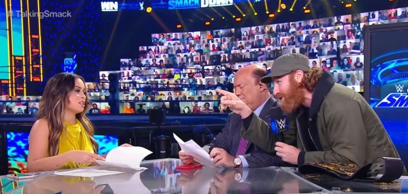 Kayla Braxton, Paul Heyman and Sami Zayn