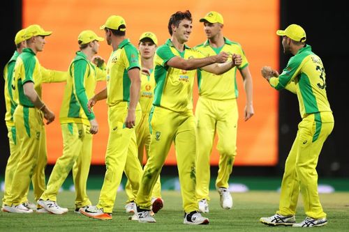 Pat Cummins celebrates with his teammates.