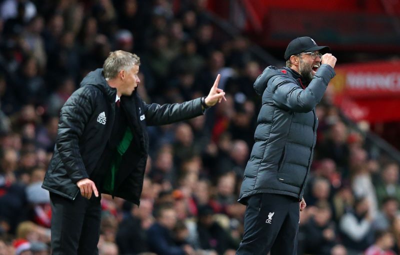 Manchester United boss Ole Gunnar Solskjaer and Liverpool manager Jurgen Klopp in action