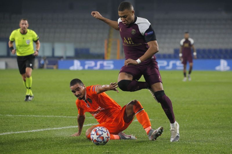 Rafael of Istanbul Basaksehir and Kylian Mbappe of Paris Saint-Germain&nbsp;