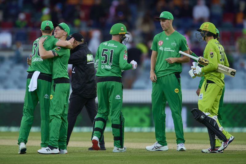 Melbourne Stars players celebrate their victory.