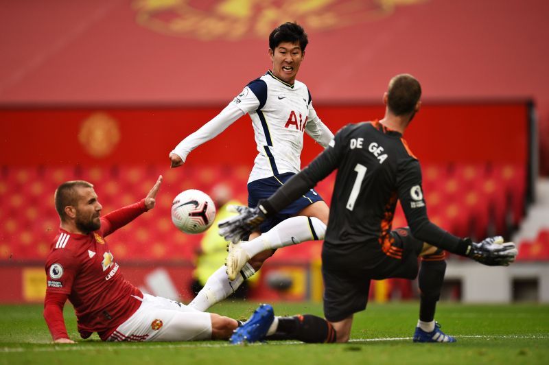 Son dinks the ball past Luke Shaw and David de Gea to score for Spurs
