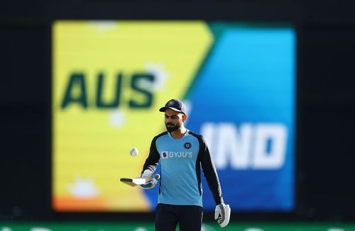 Virat Kohli warms up ahead of the game