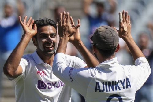 Ravichandran Ashwin celebrates with Ajinkya Rahane after picking up a wicket