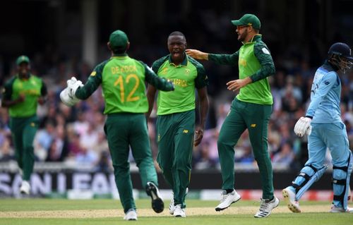 Kagiso Rabada and Quinton de Kock celebrating the wicket of Joe Root