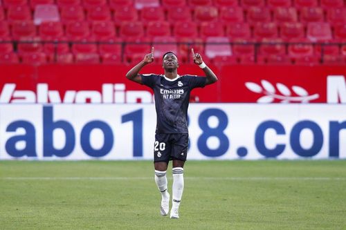 Vinicius celebrates Real Madrid's goal against Sevilla