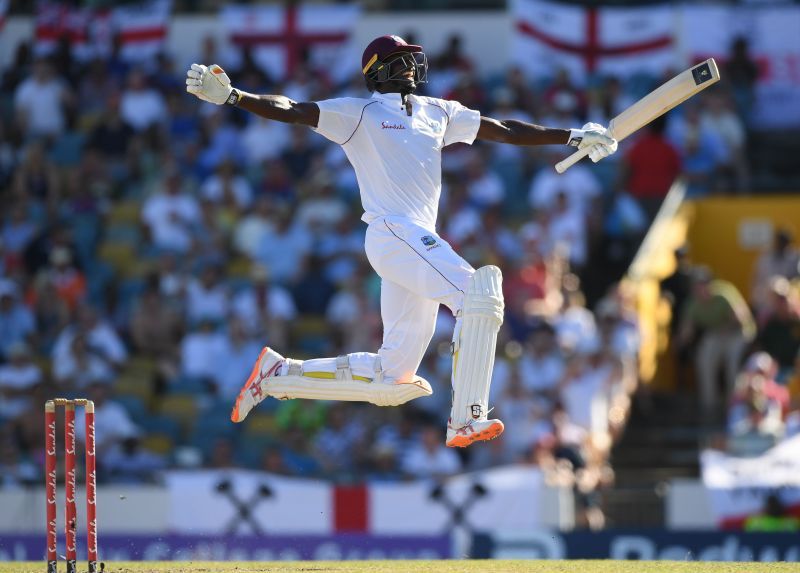 Jason Holder celebrates a milestone against England at Southampton