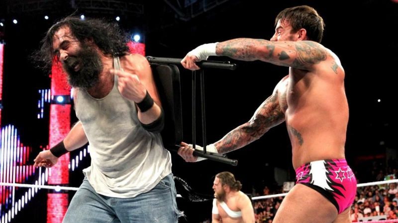 Following his win by disqualification, CM Punk took the fight to the Wyatts along with Daniel Bryan