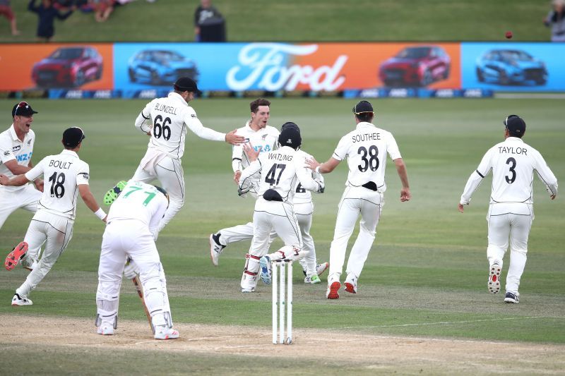 Mitchell Santner celebrates after taking a stunning catch