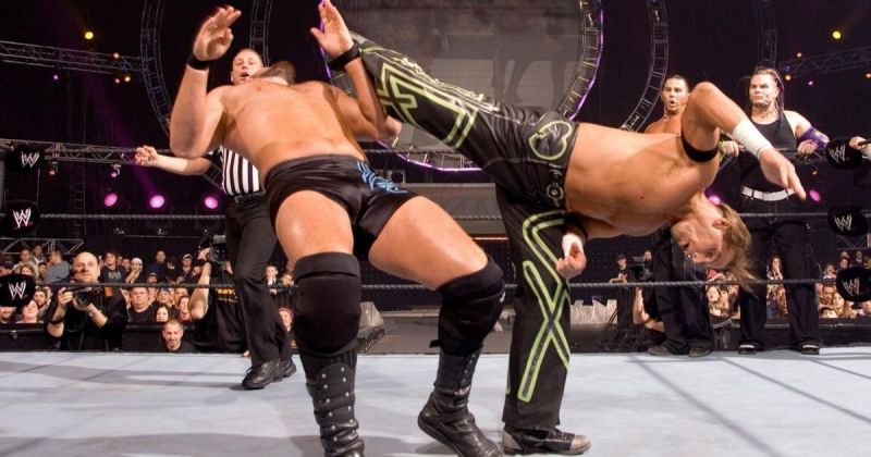 Shawn Michaels delivering the superkick to Mike Knox.