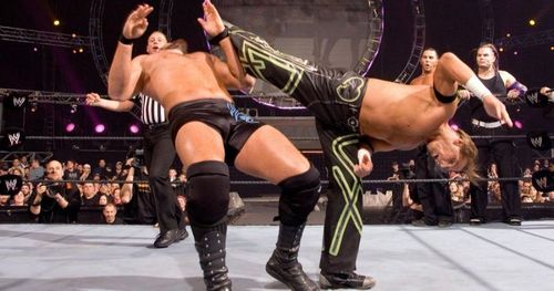 Shawn Michaels delivering the superkick to Mike Knox.