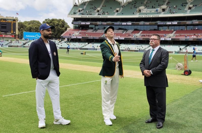 Match referee David Boon is pictured conducting a coin-toss between Australia and India