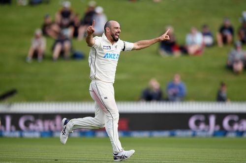 Daryl Mitchell celebrating the wicket of Jason Holder