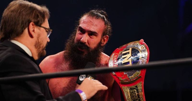 Brodie Lee with the AEW TNT Championship.