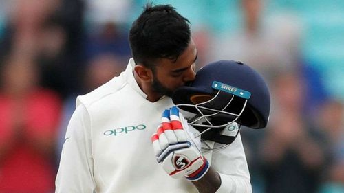 KL Rahul celebrates after scoring a century.