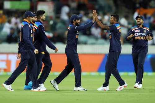 Team India celebrates after picking up a wicket.