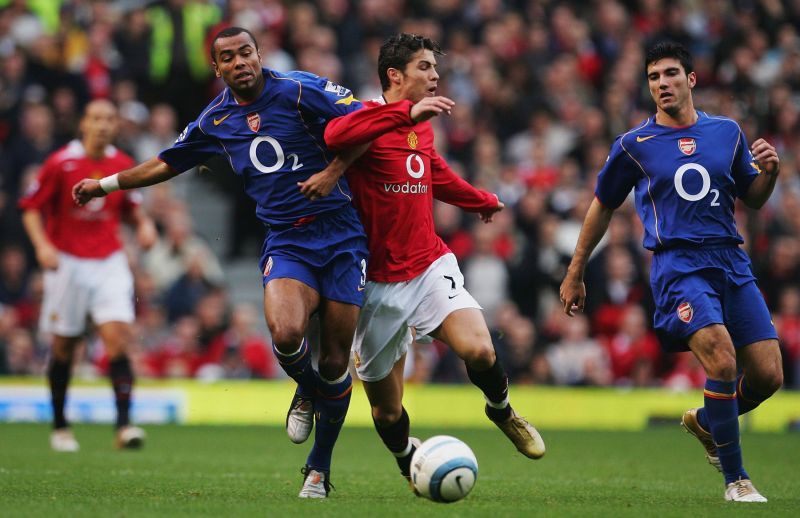 Ashley Cole and a young Cristiano Ronaldo battle it out