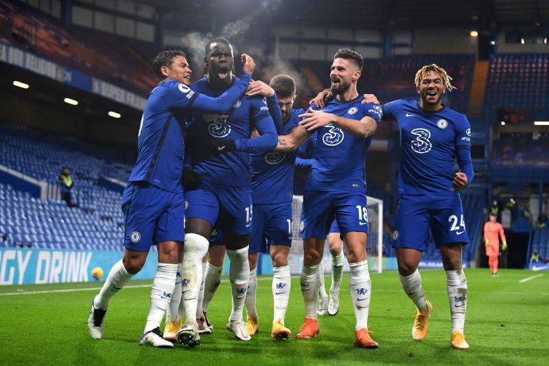 The Chelsea players celebrate scoring a goal