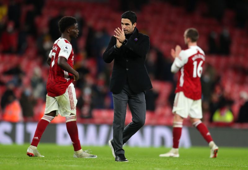 Mikel Arteta applauds the fans on their return to the Emirates Stadium despite the defeat to Burnley
