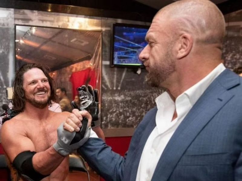 AJ Styles and Triple H.