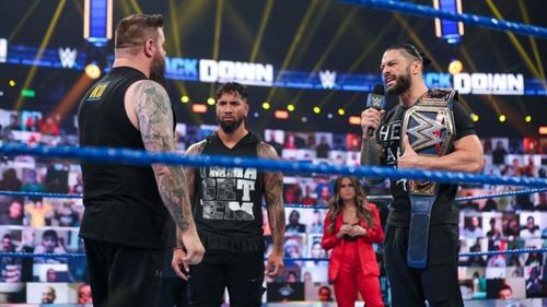 Kevin Owens (left) will face Roman Reigns at TLC