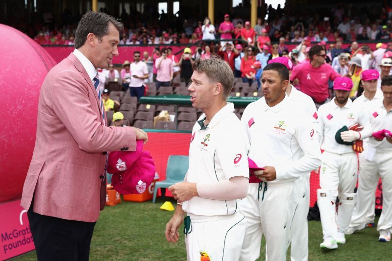 Glenn McGrath presenting David Warner with the pink cap. Warner high scored in that game with his 335 not out.