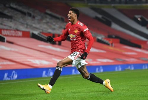 Marcus Rashford celebrates the winner for Manchester United against Wolverhampton Wanderers