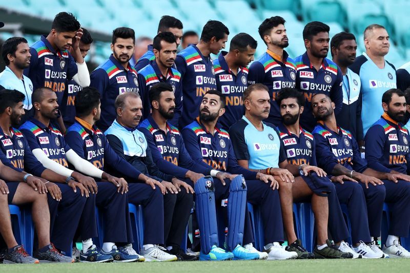 Virat Kohli and India pose for a team photo before the game