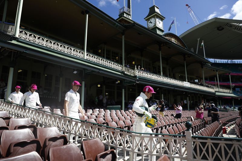 Tim Paine leading the Australian side to the ground against India.